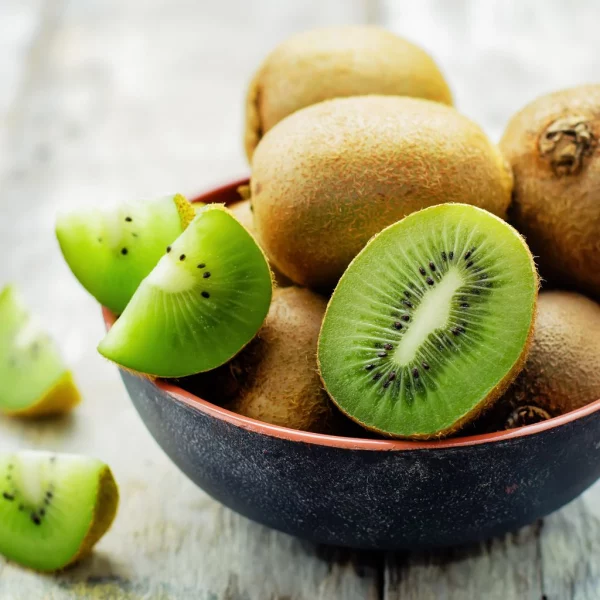 Kiwi rich in Vitamin C and fiber, supports digestion and prevents constipation.