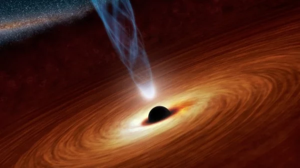 The Two Largest Black Holes Ever Discovered