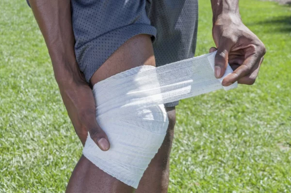 Using compression bandages helps reduce swelling and protect injured muscles.